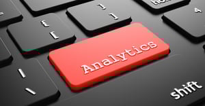 Analytics on Red Button Enter on Black Computer Keyboard.