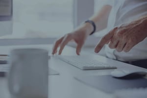 man with hands typing